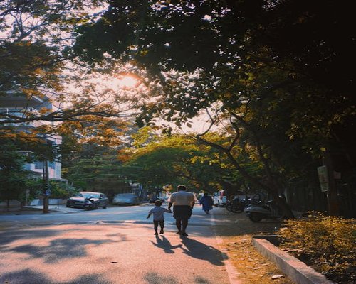 An Indian family going for a pleasant evening walk in a neighborhood park